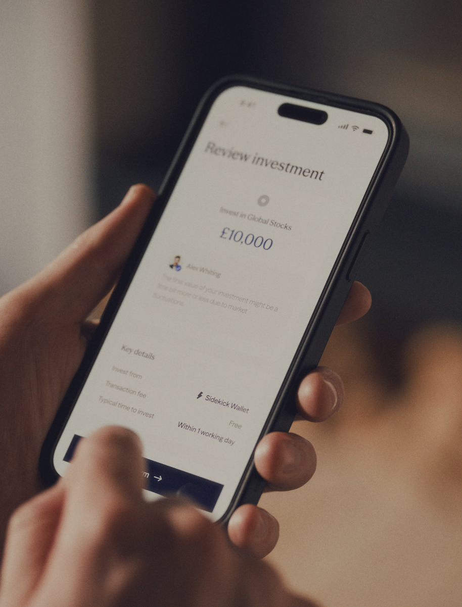 Hand holding a smartphone displaying the Sidekick app review investment screen showing £10,000